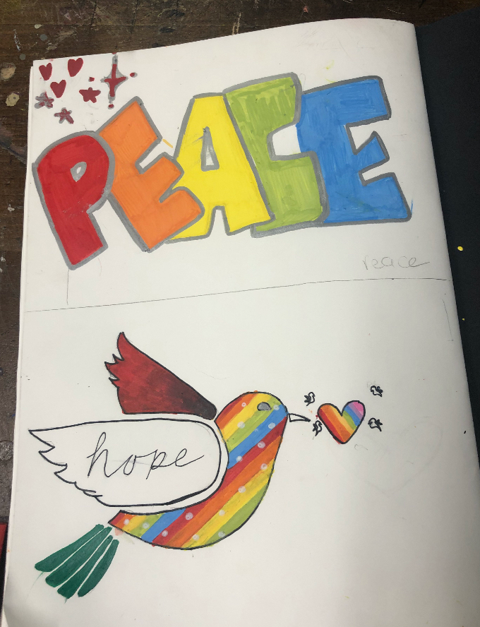 A dove, written above the word 'Peace' multicoloured 